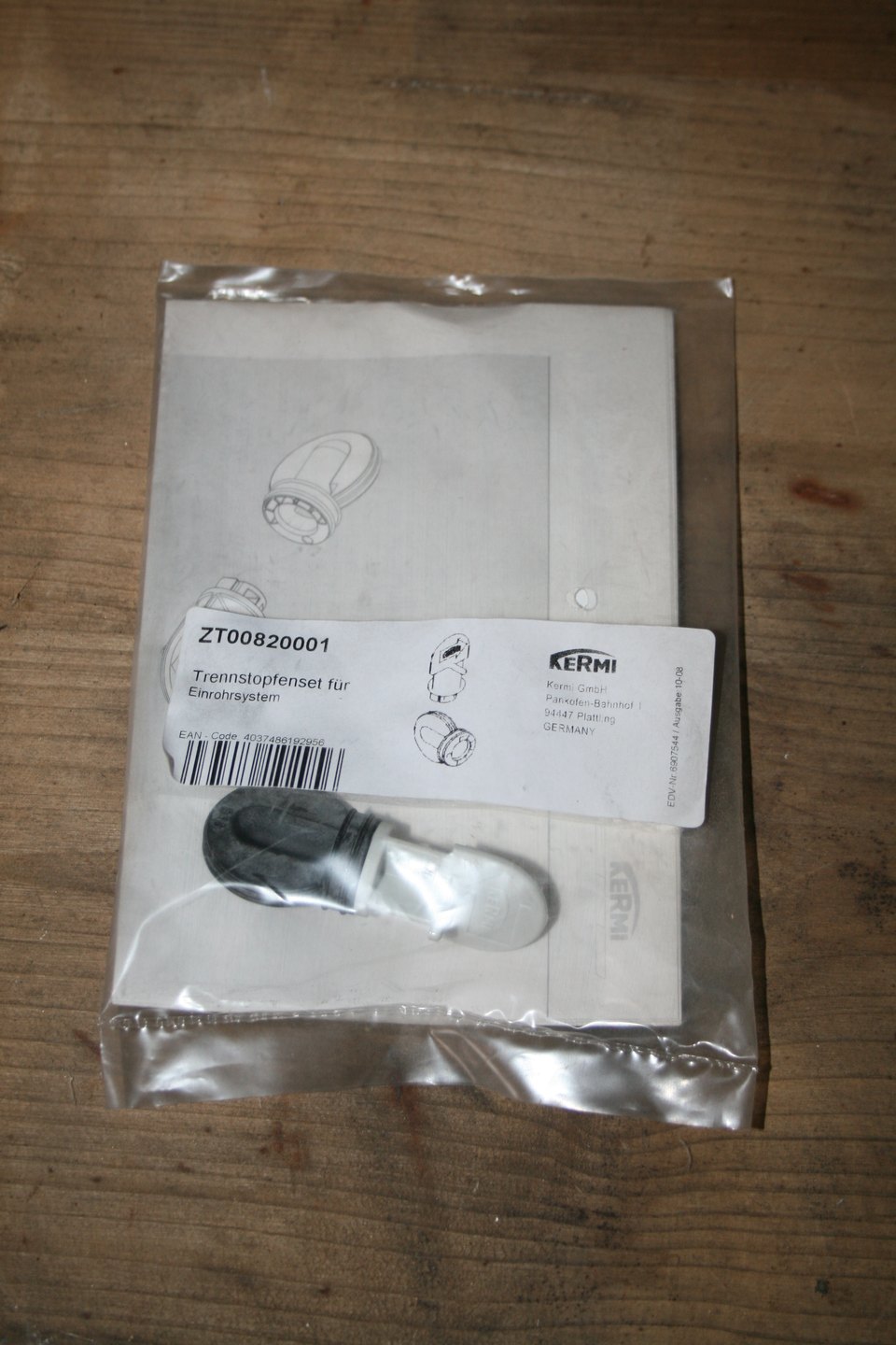 Kit de bouchons de séparation Kermi ZT00820001 pour système monotube, sachet scellé avec notice de montage et étiquette du fabricant