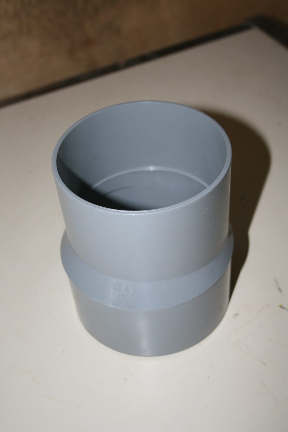 Réduction PVC Ø125-110 GIRPI grise, marquage moulé